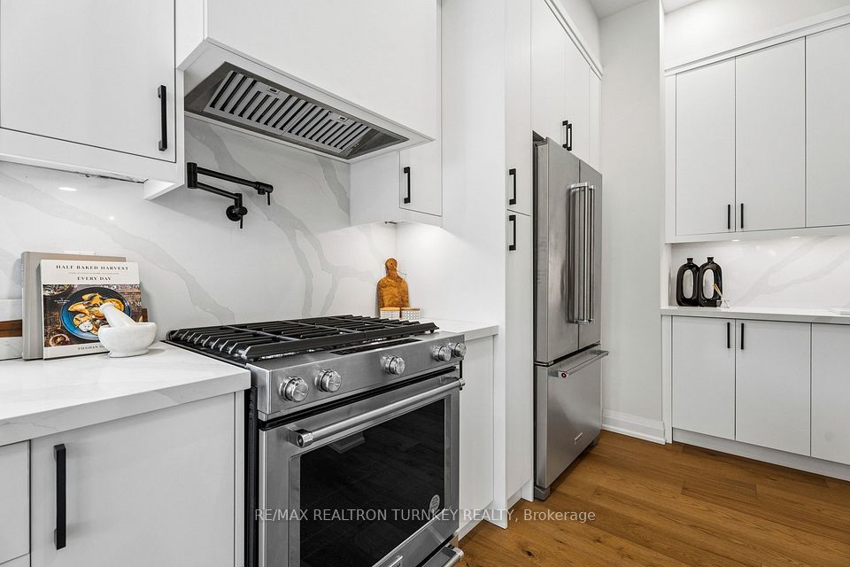 Gas stove with commercial-grade range hood