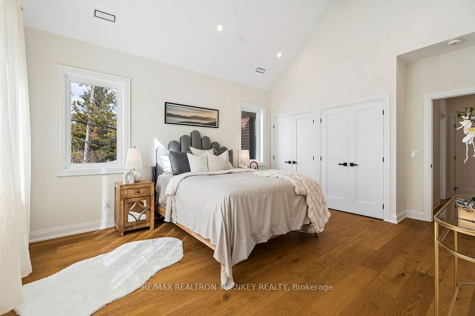 Double closets and lots of windows