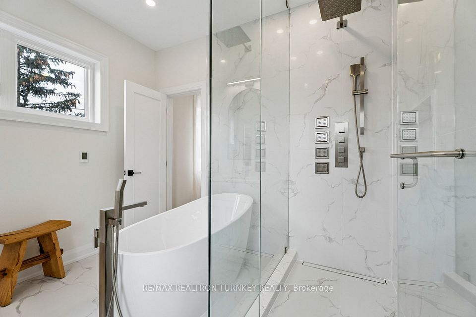 With Soaker tub and glass shower