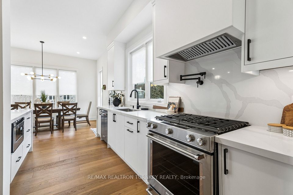 Gourmet kitchen with SS appliances & pot filler!