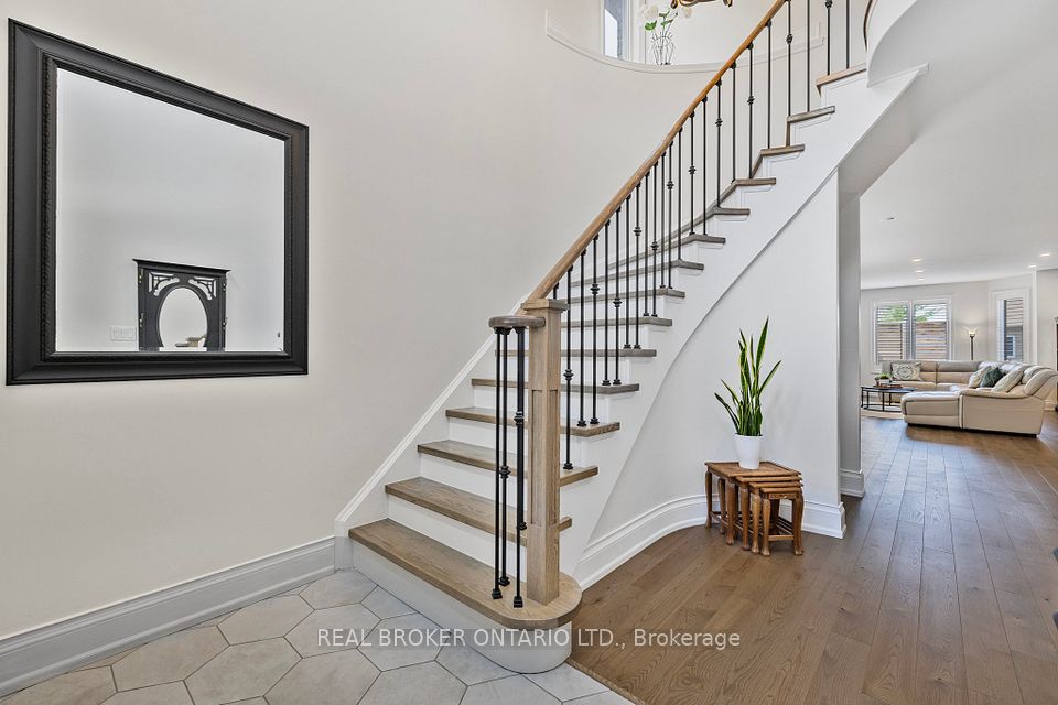 Bright Entryway Leading Upstairs