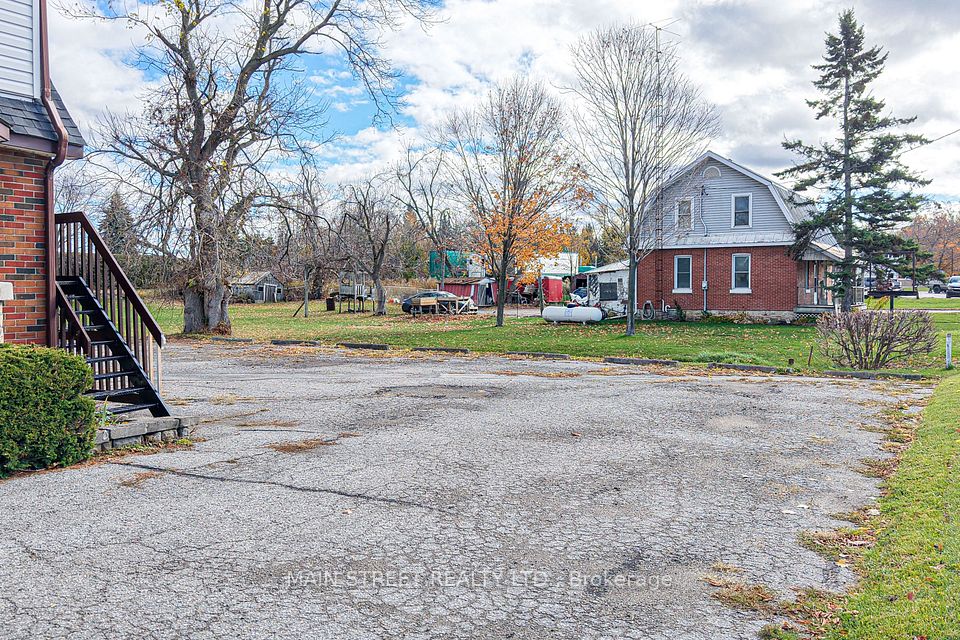 parking and entrance to upper floor