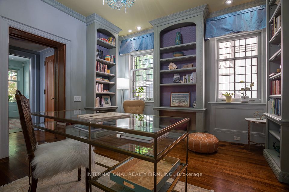Bookshelves lined with silk moiré fabric.