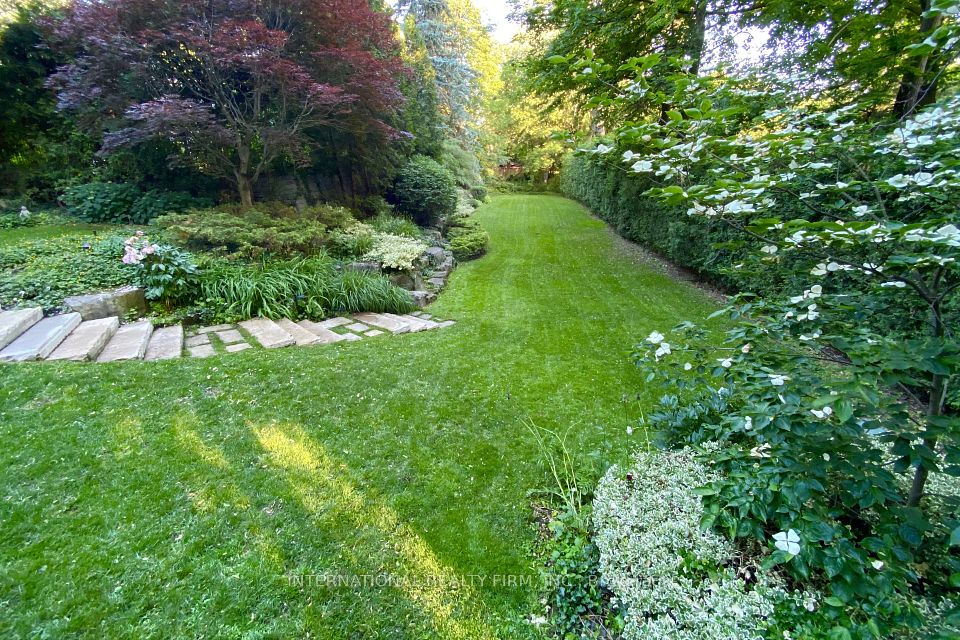 Over 1/2 an acre of private gardens.