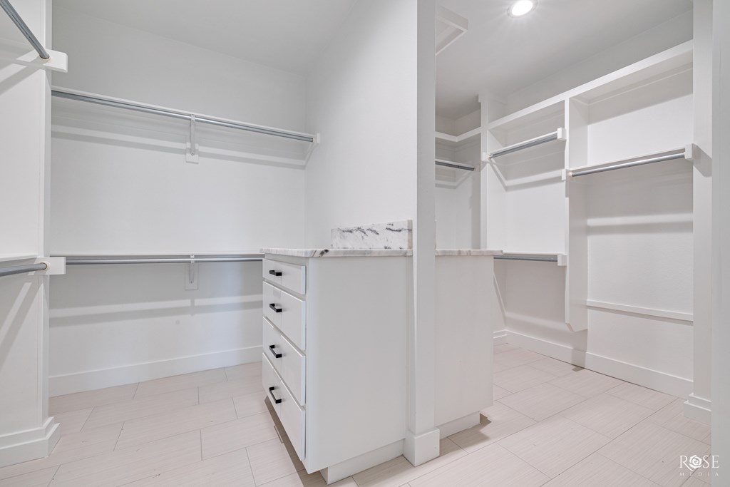 Primary walk-in closet.