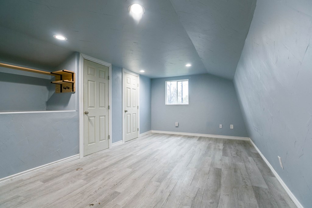 Upstairs of red roof building heated/cooled used a