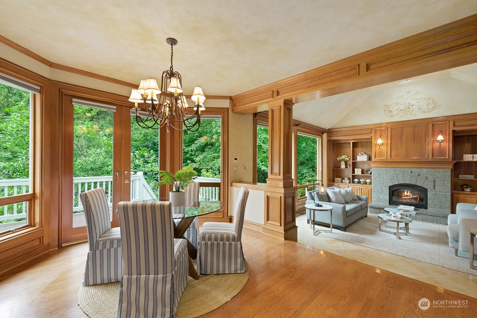 Casual dining area with a gorgeous view of the back yard.