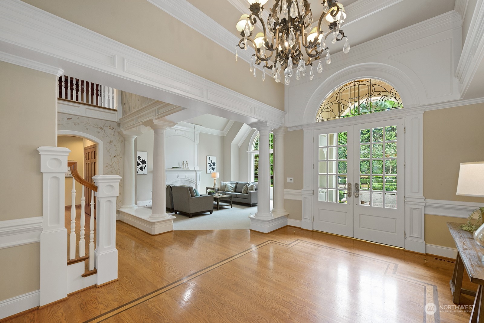 Grand entry with custom French Doors, showcasing William Buchan's signature finishes and trim!