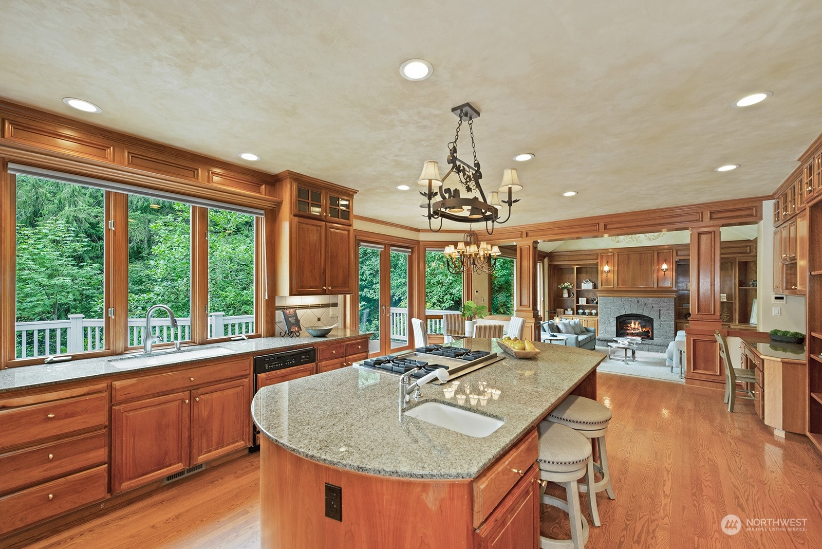 Kitchen opens to the family room with access to the expansive deck.