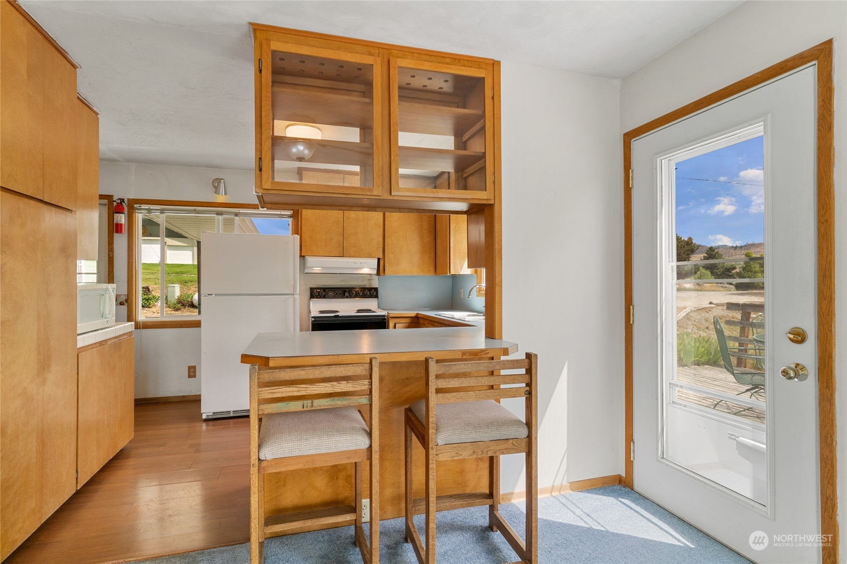 Expansive View Deck Opens to Primary Bedroom and Living Room