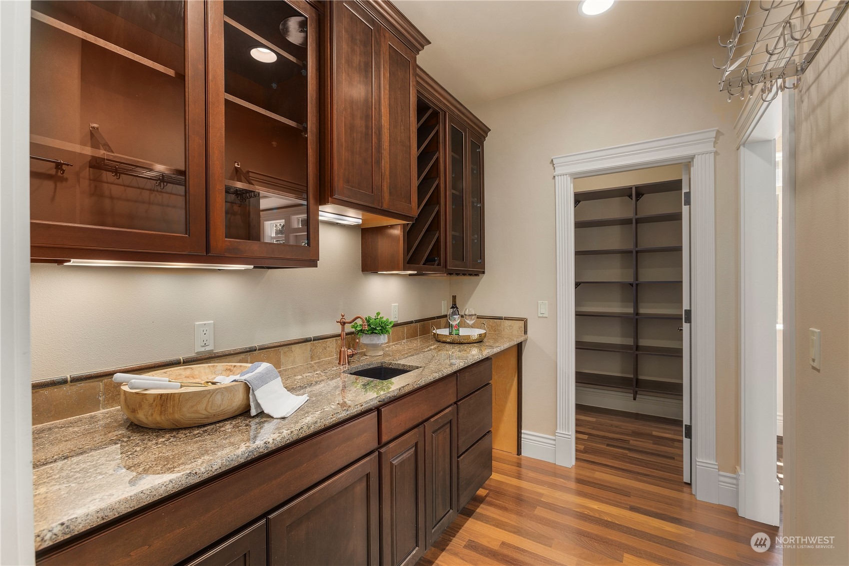 Butler's pantry and full walk-in pantry.