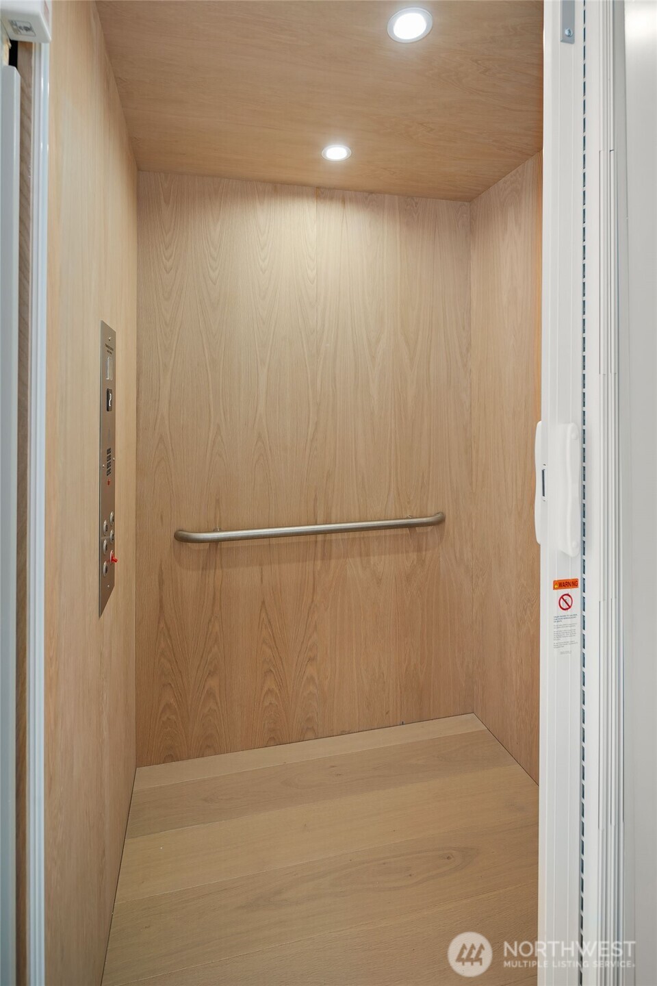 Elevator off of kitchen on main area