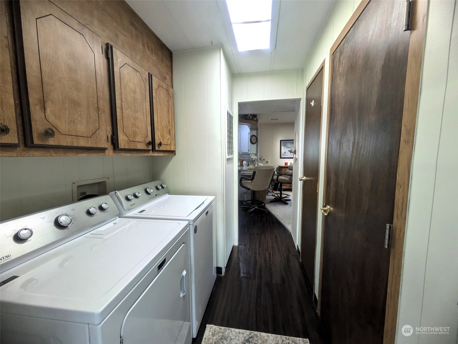 washer and dryer stay - cabinets and a closet for storage