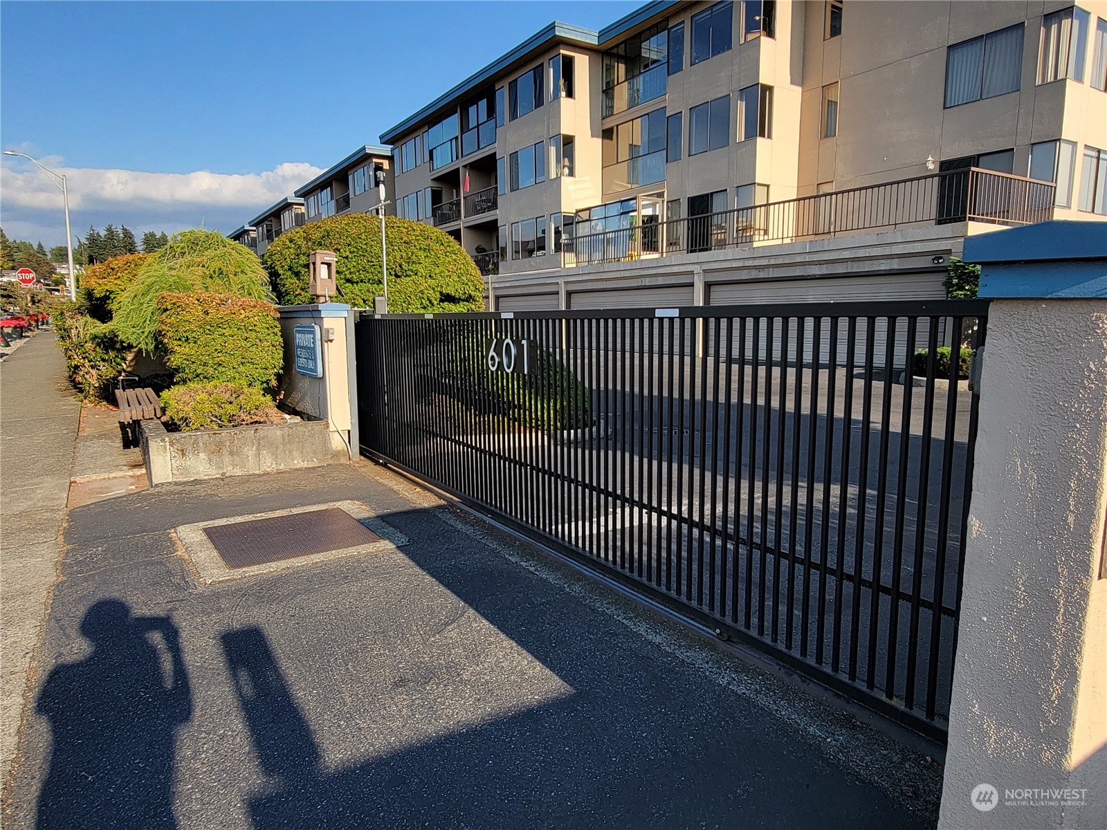 View of the parking stall in the garage. Access with the remote control operated garage door opener. The enormous, lighted storage locker is in front of the parking stall. The side entrance lobby is easily accessed from here.