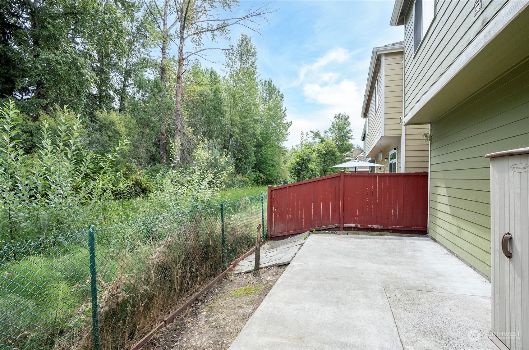 The property backs onto a greenbelt, providing extra privacy.