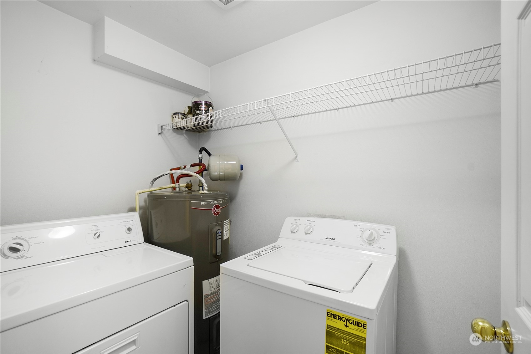 Primary bedroom walk in closet