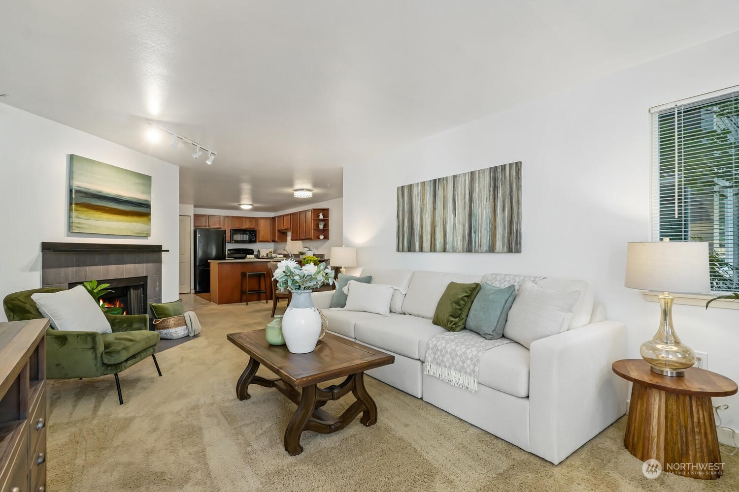 Another view of the Living Room flowing into the Kitchen and Dining areas