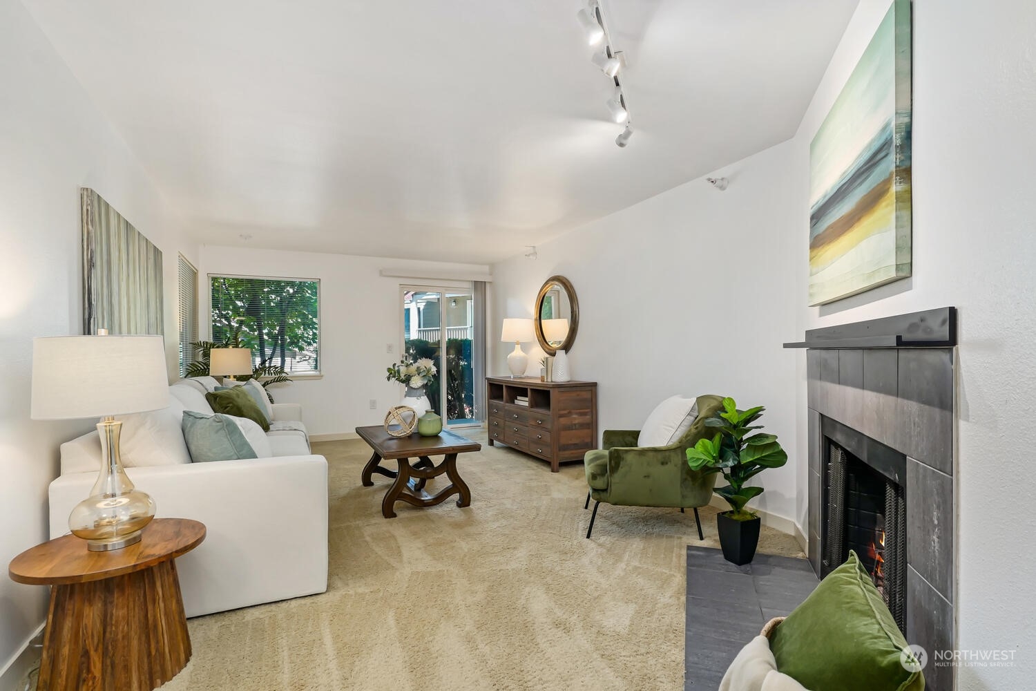 Cozy Living Room with outside access to private patio and wood burning fireplace