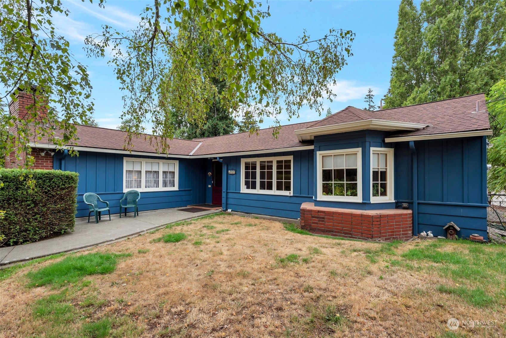 Whimsical rambler on corner lot