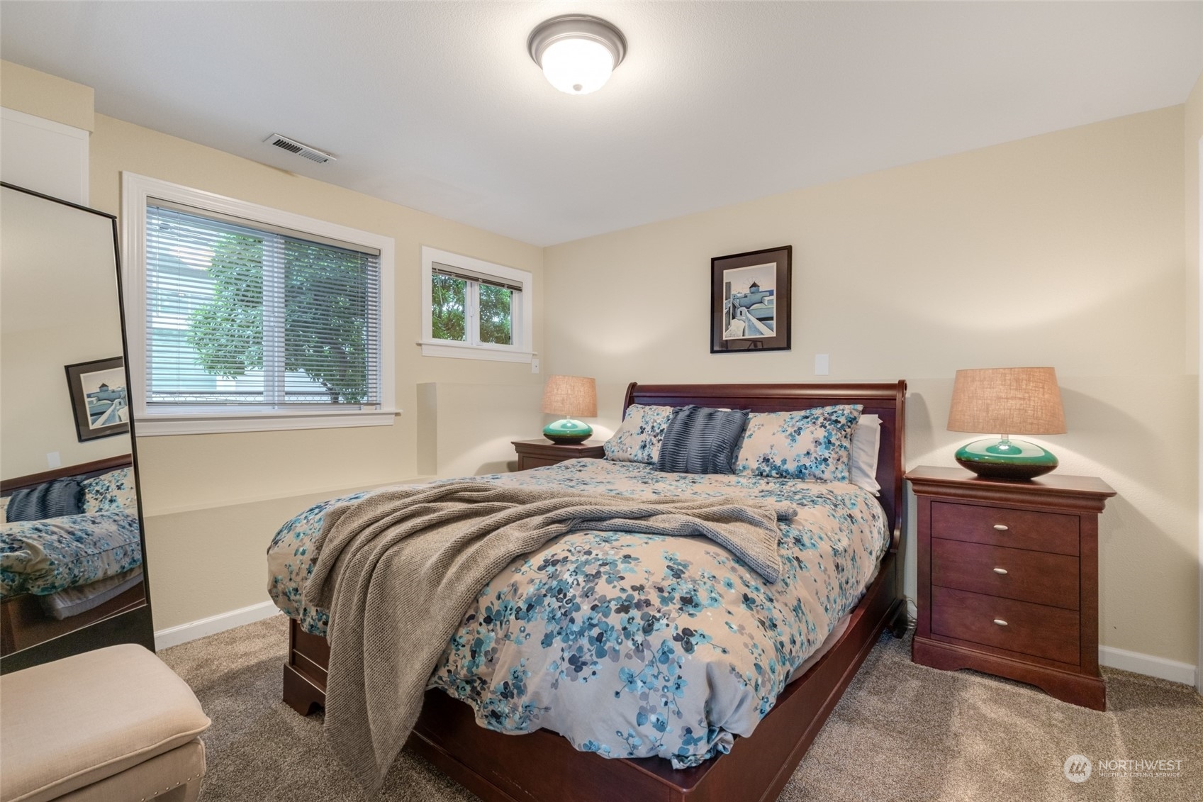 Detached guest house features a Murphy bed, full bathroom, and kitchenette downstairs, along with a beautiful office space upstairs complete with built-in cabinets. A perfect blend of comfort and functionality for guests or as a home office