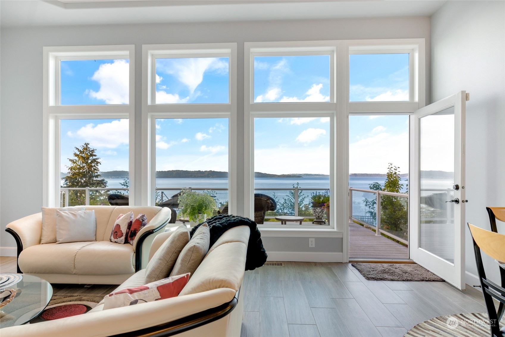 Stunning panoramic views of Puget Sound and the Olympic Mountains from every corner of your main floor