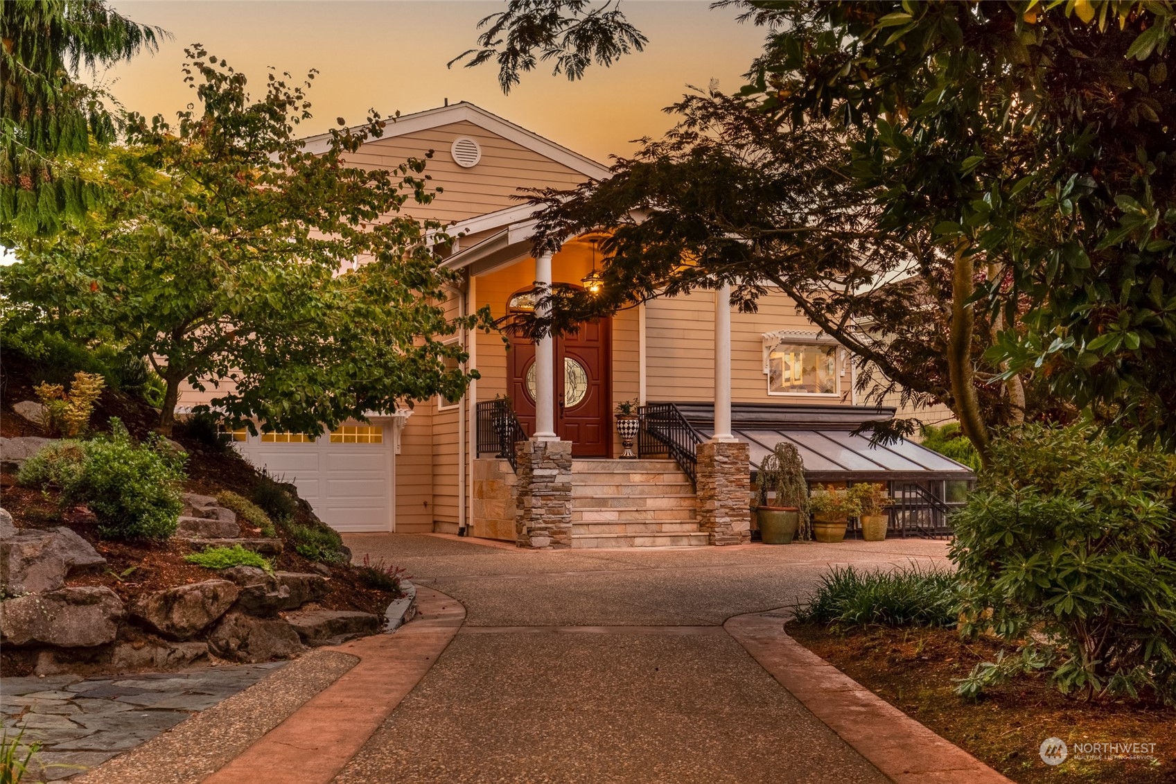 Beautiful iron gates provide complete privacy and security, adding a touch of elegance to the estate