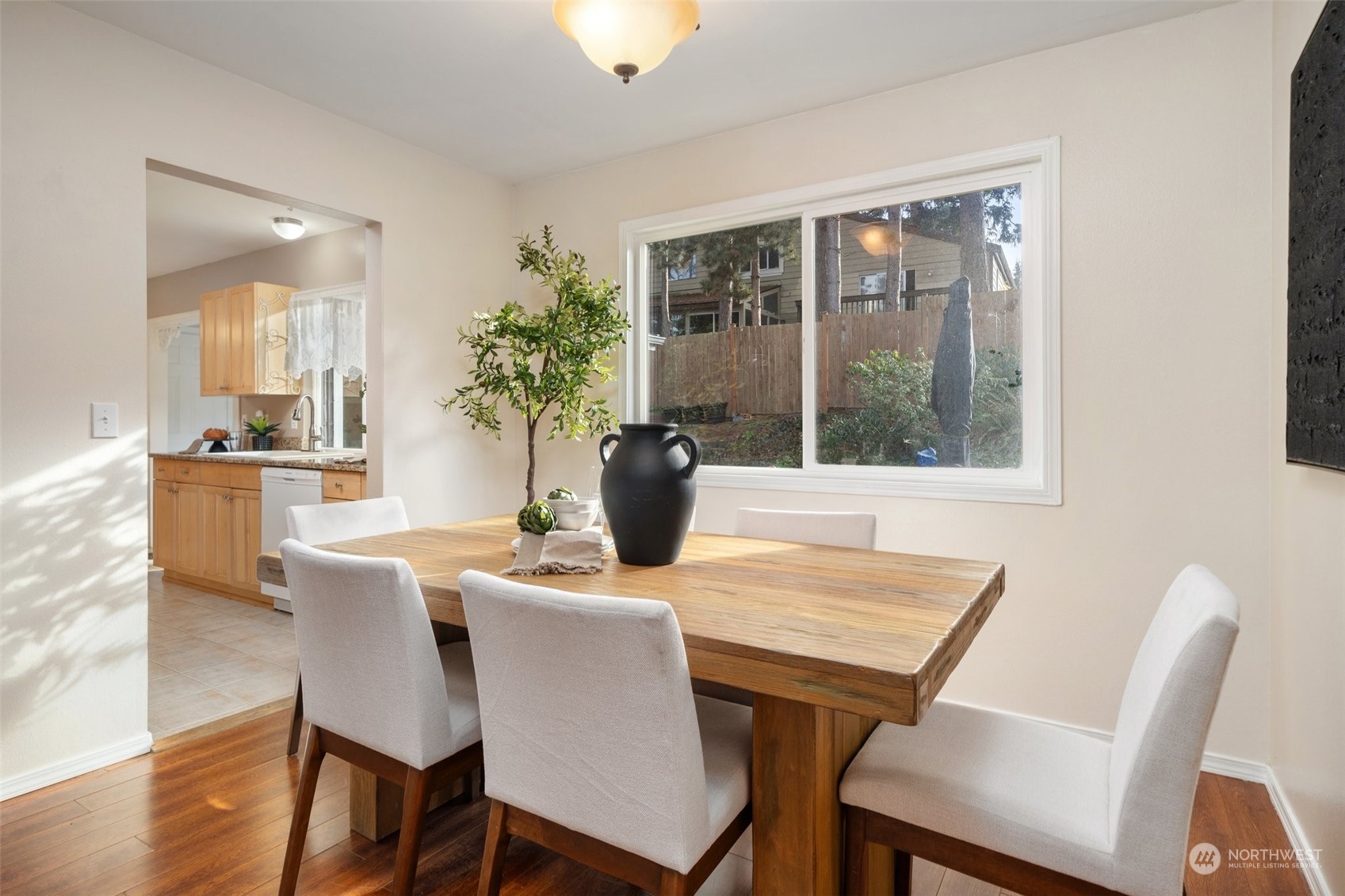 Dining Room with Kitchen in background