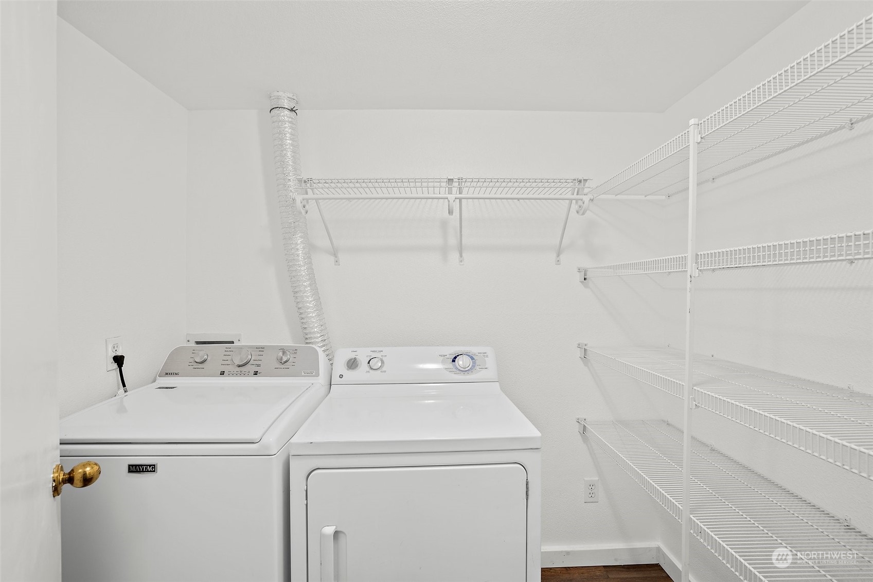 In unit laundry room with full size washer and dryer!  Lots of storage!