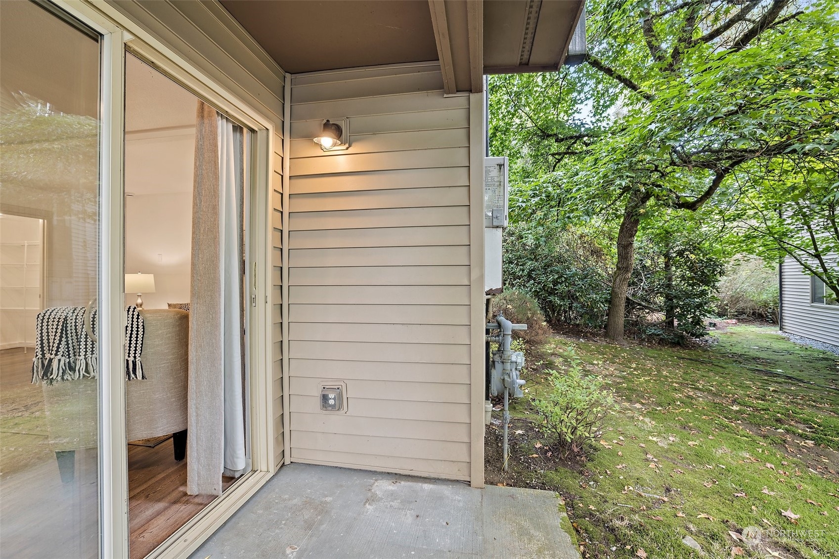 Private patio off of dining area.  Perfect for your BBQ and bistro table.