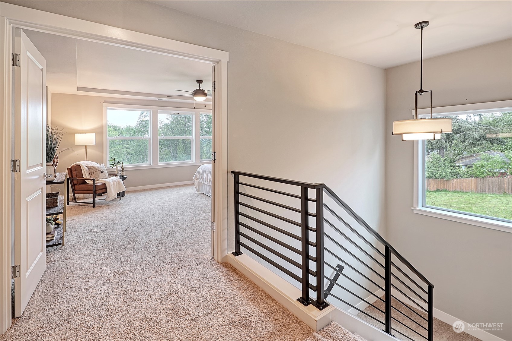 French doors welcome you to the oversized primary suite.