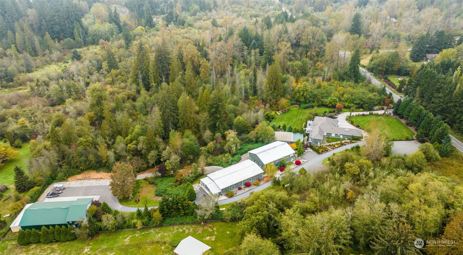 This private estate features over 20,000 square feet of total building space. Beyond your private 10 acres, is an additional 40 acres of county-owned protected land, preventing future development. Just imagine all this tranquility, while being just 4 miles from downtown Woodinville and only 20 min to Bellevue.