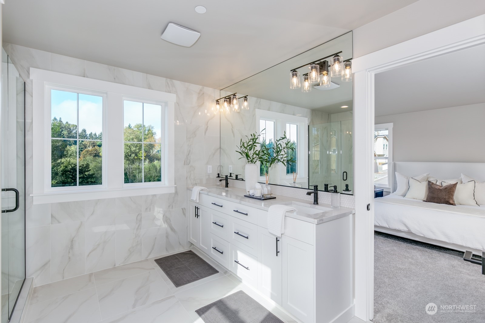 Large Primary bath with extensive ceramic tile detail.