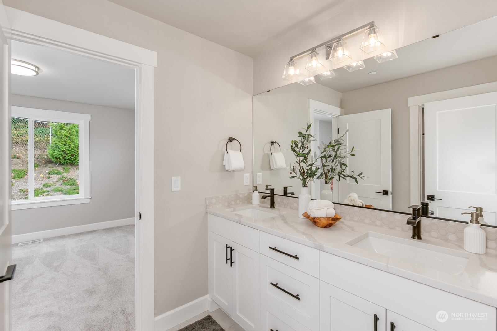 A spacious upper floor full bathroom connects to 2 bedrooms for ultimate convenience.