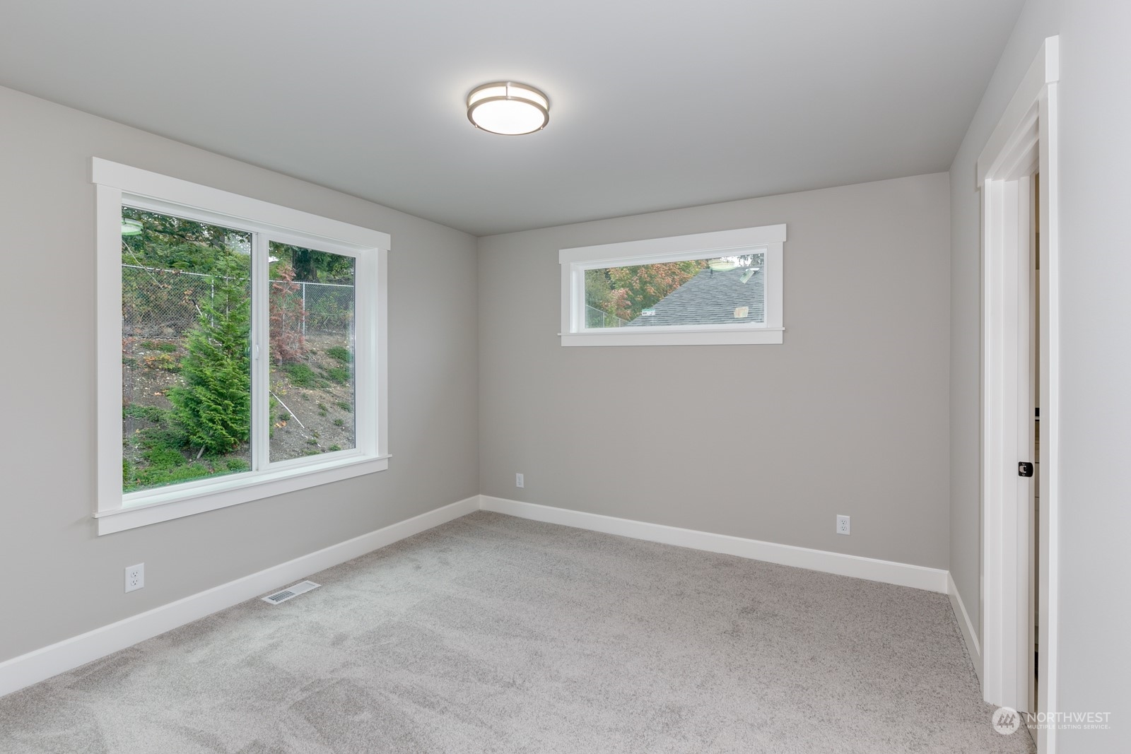 1 of 2 large upper floor bedrooms connects to a full bathroom, Jack n' Jill style.