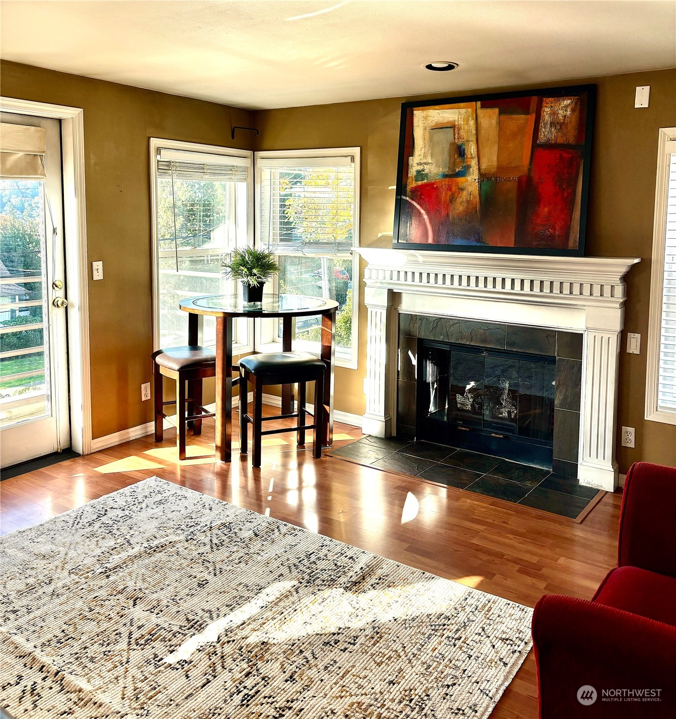 Cozy fireplace in the living room. Nice western facing lanai off the front.