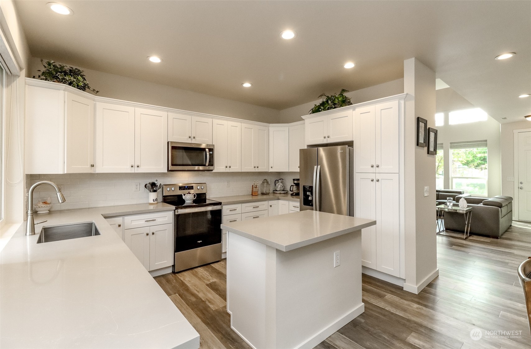 Quartz countertops & stainless appliances in the kitchen