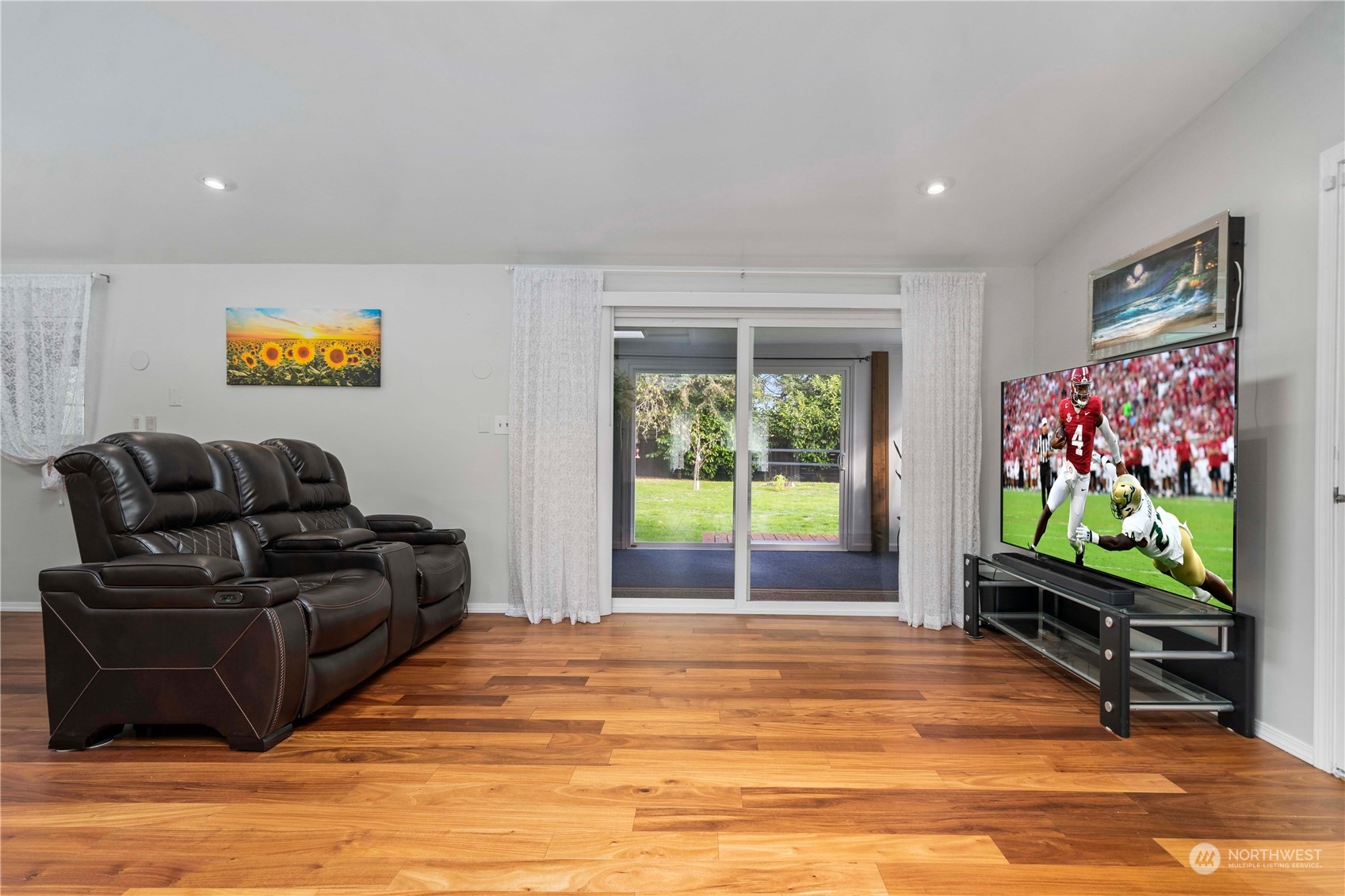 Family room leads to outdoor covered patio