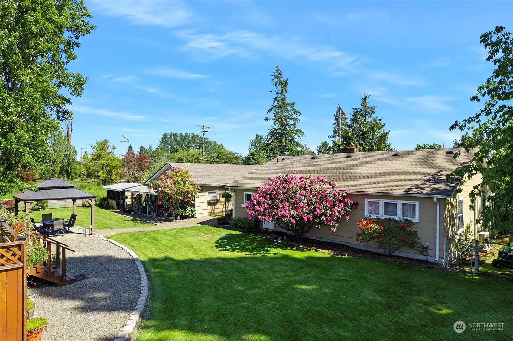 ~Relax in your Park-like Backyard with well established variety of  Roses, Rhododendrons, Lilacs, Azalea Bushes, Hydrangeas ~ Blooms start in April ~