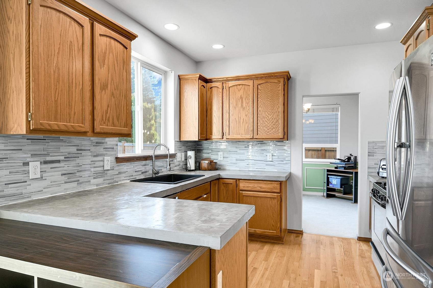 Concrete countertops and custom tile backsplash