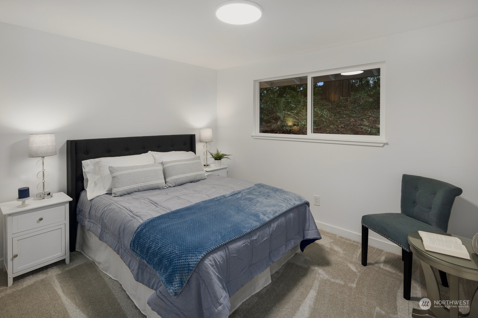 Guest bedroom. New carpet throughout.