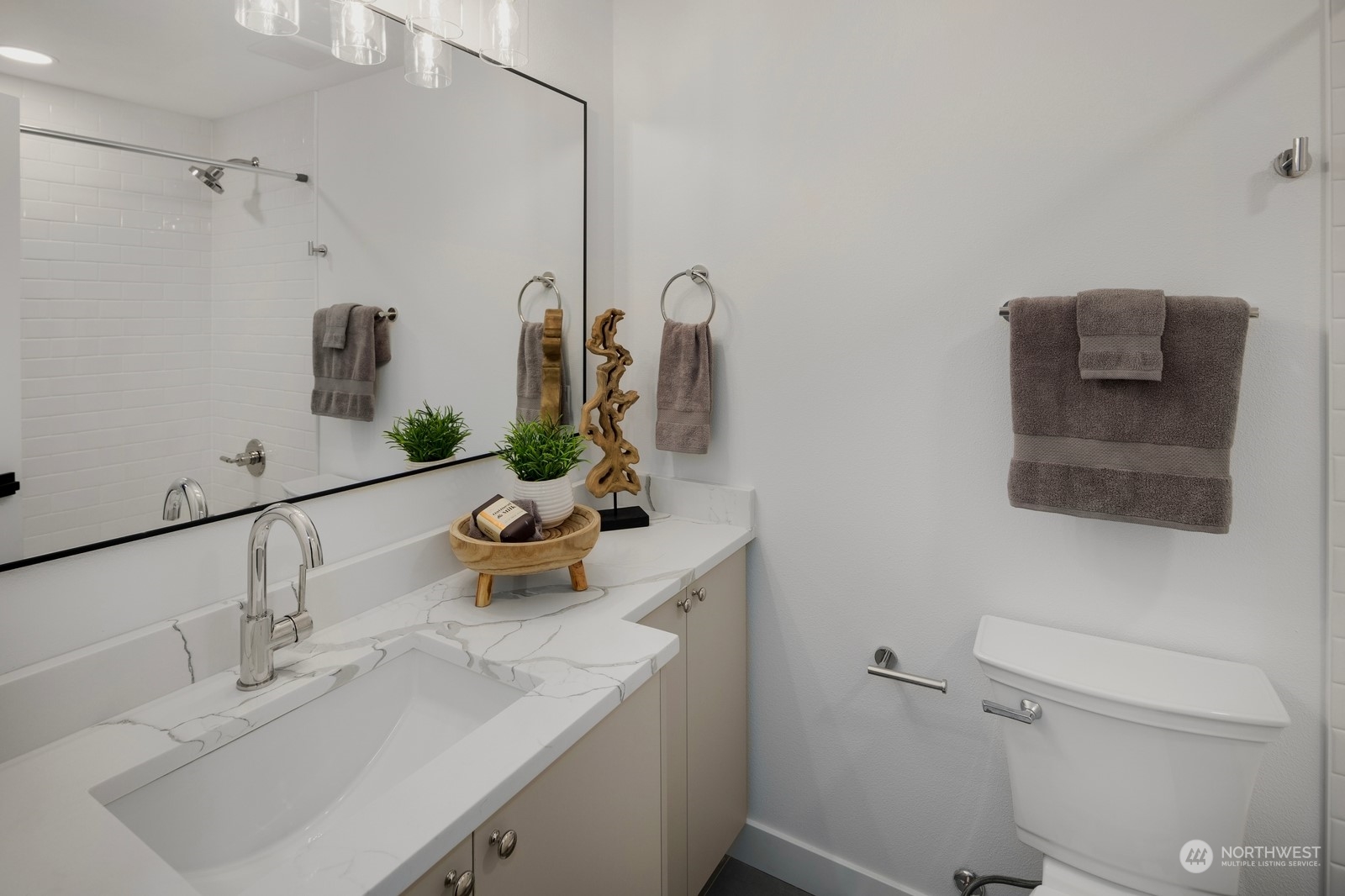 Upper floor full bathroom. All bathrooms professionally designed independently of eachother with custom cabinets, and beautiful finishes and stonework.