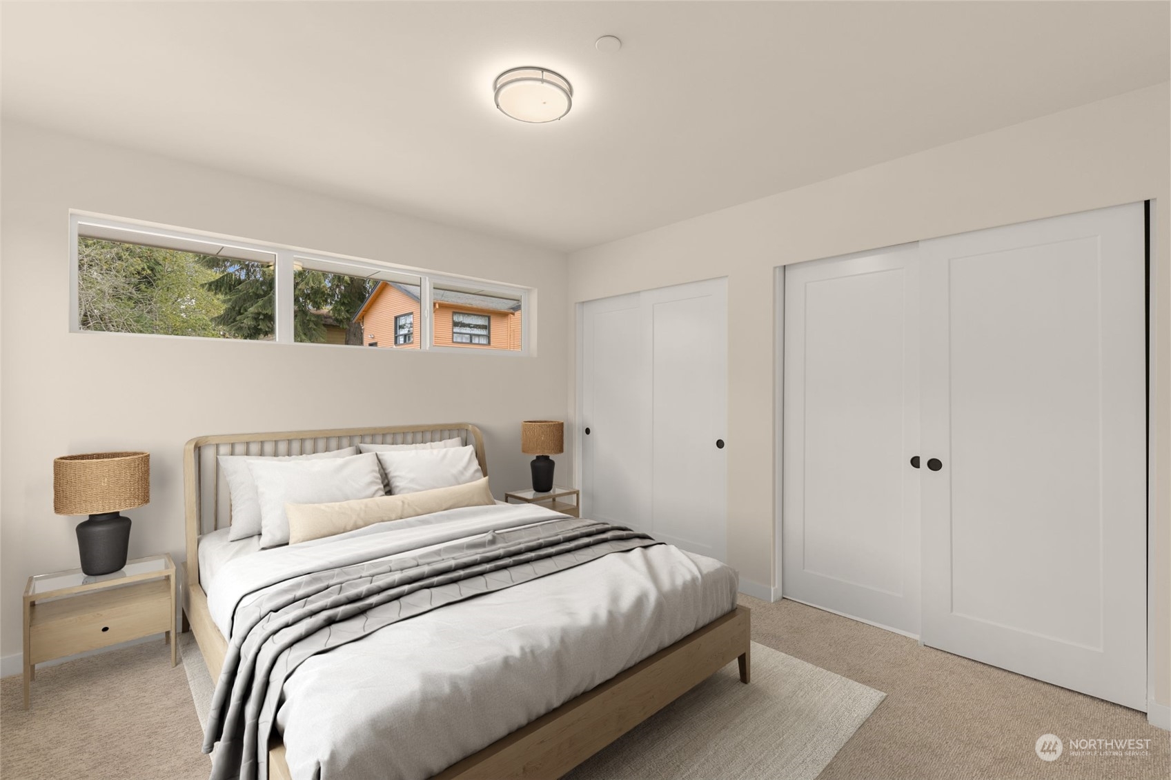 Dual vanities with crisp white countertops and matte black accents elevate your morning routine. The spacious design and framed mirrors make getting ready a breeze.