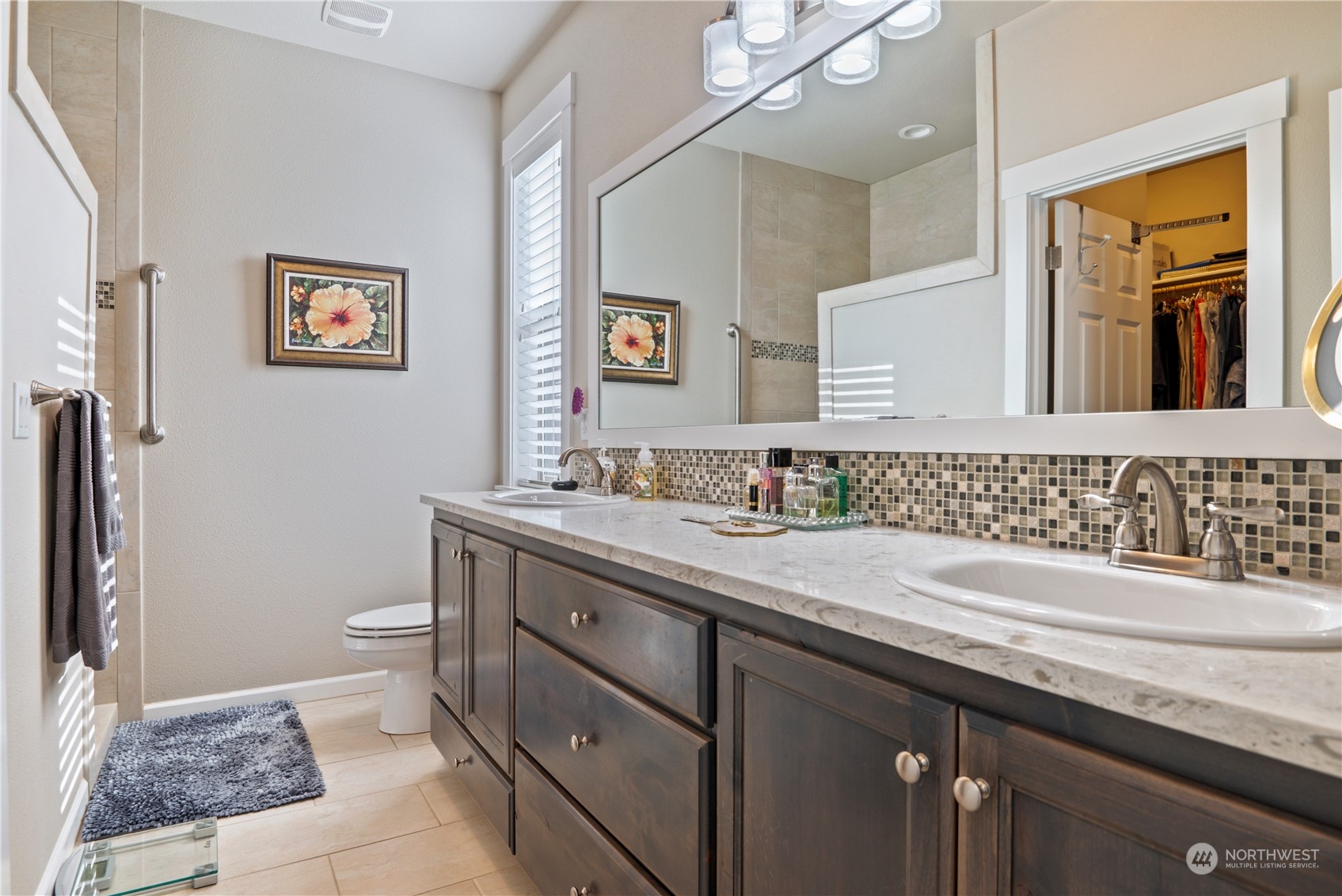 Primary bath with quartz and tile backsplash