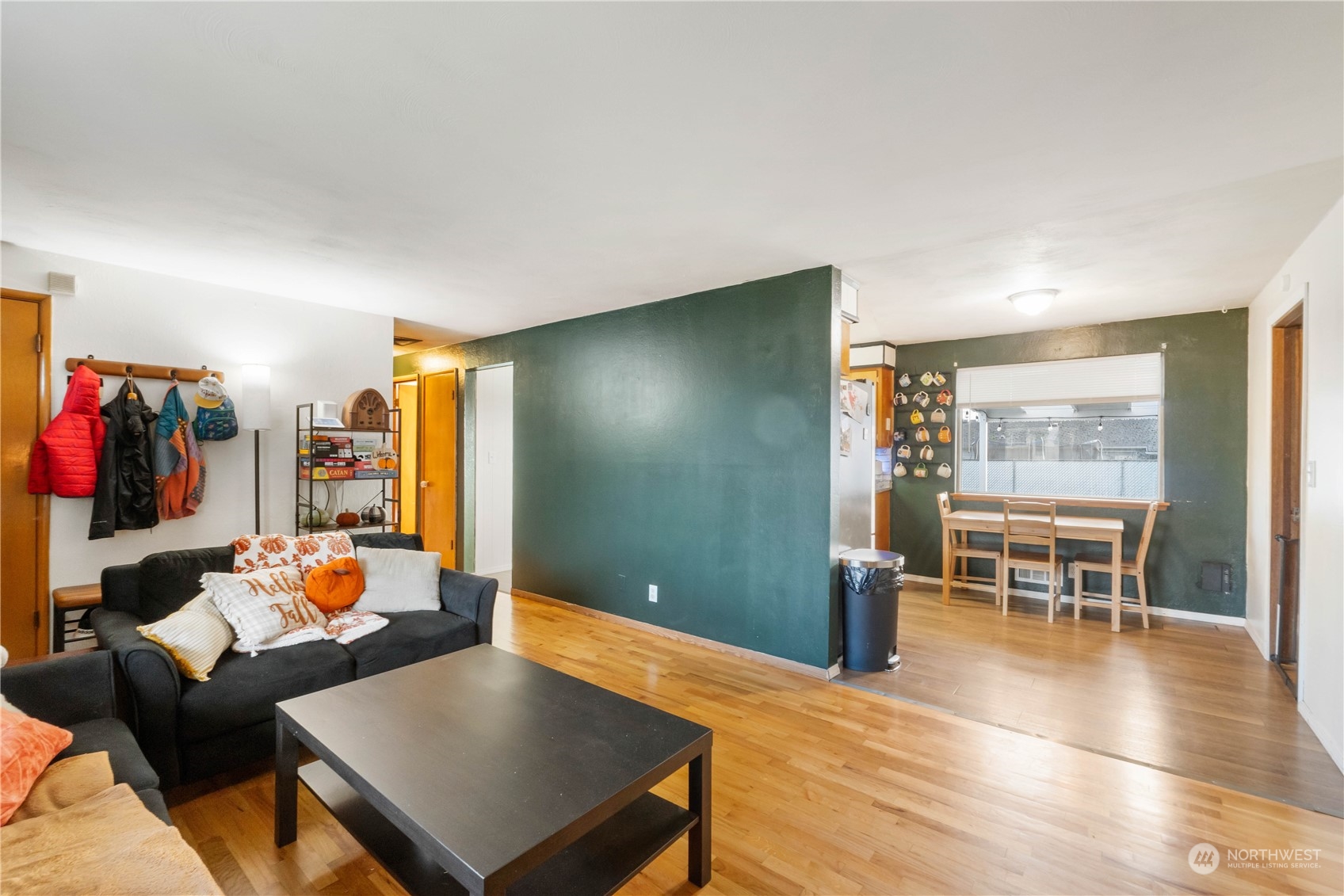 Notice the hardwoods flow all the way down the hall and into the guest rooms.