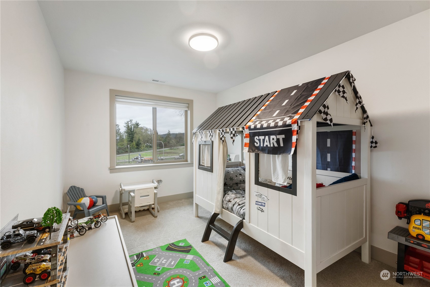 Bedrooms are spacious with plenty of room for decorative beds and toys.