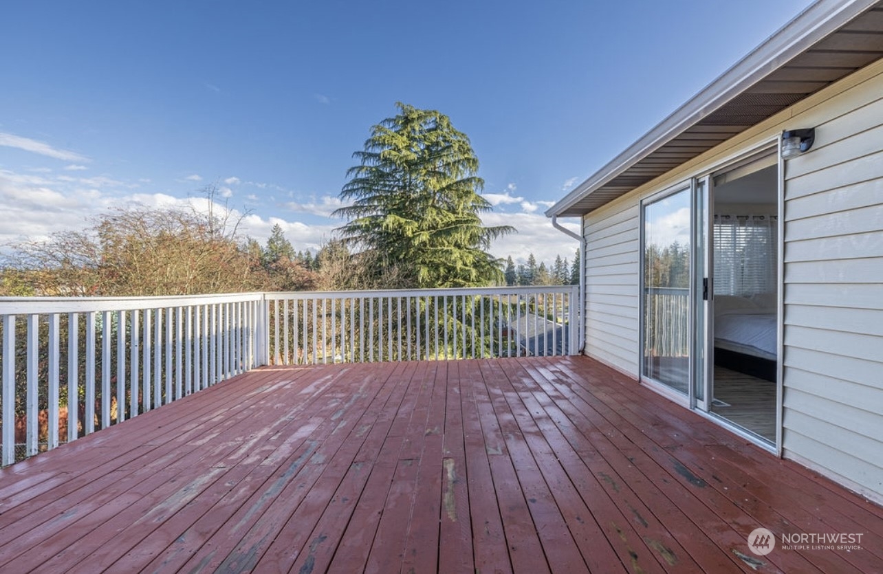 Big Deck can access from Master Bedroom and Rec Room upstairs.