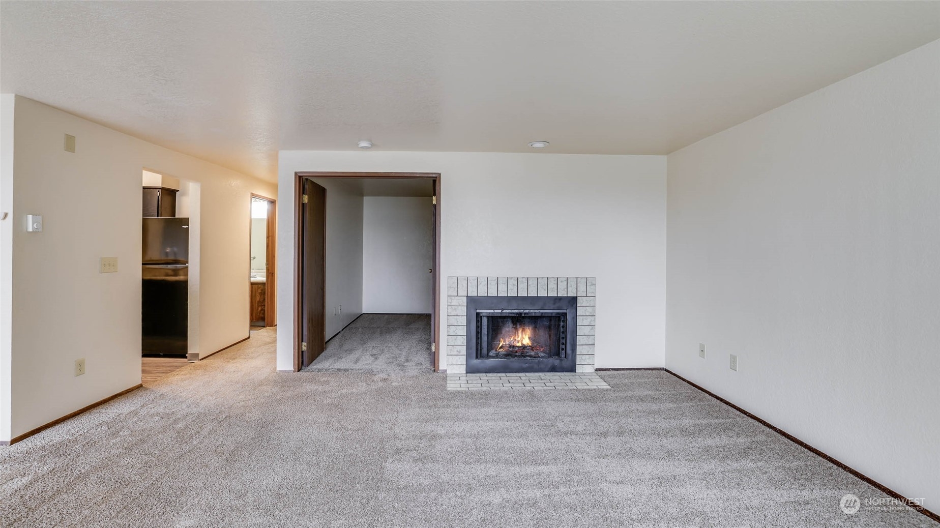 Open floorplan seamlessly flows into the dining area and kitchen.