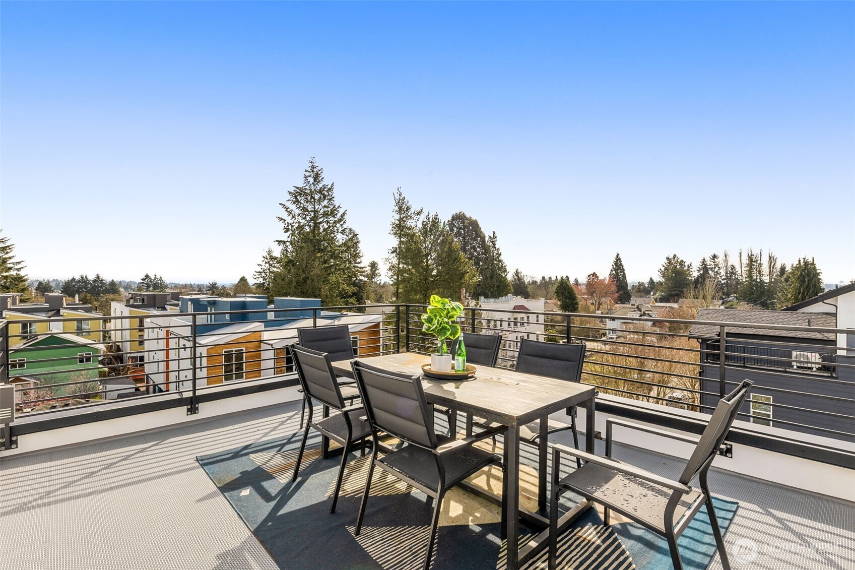 Host unforgettable evenings on your private rooftop deck with expansive views and entertainment space.