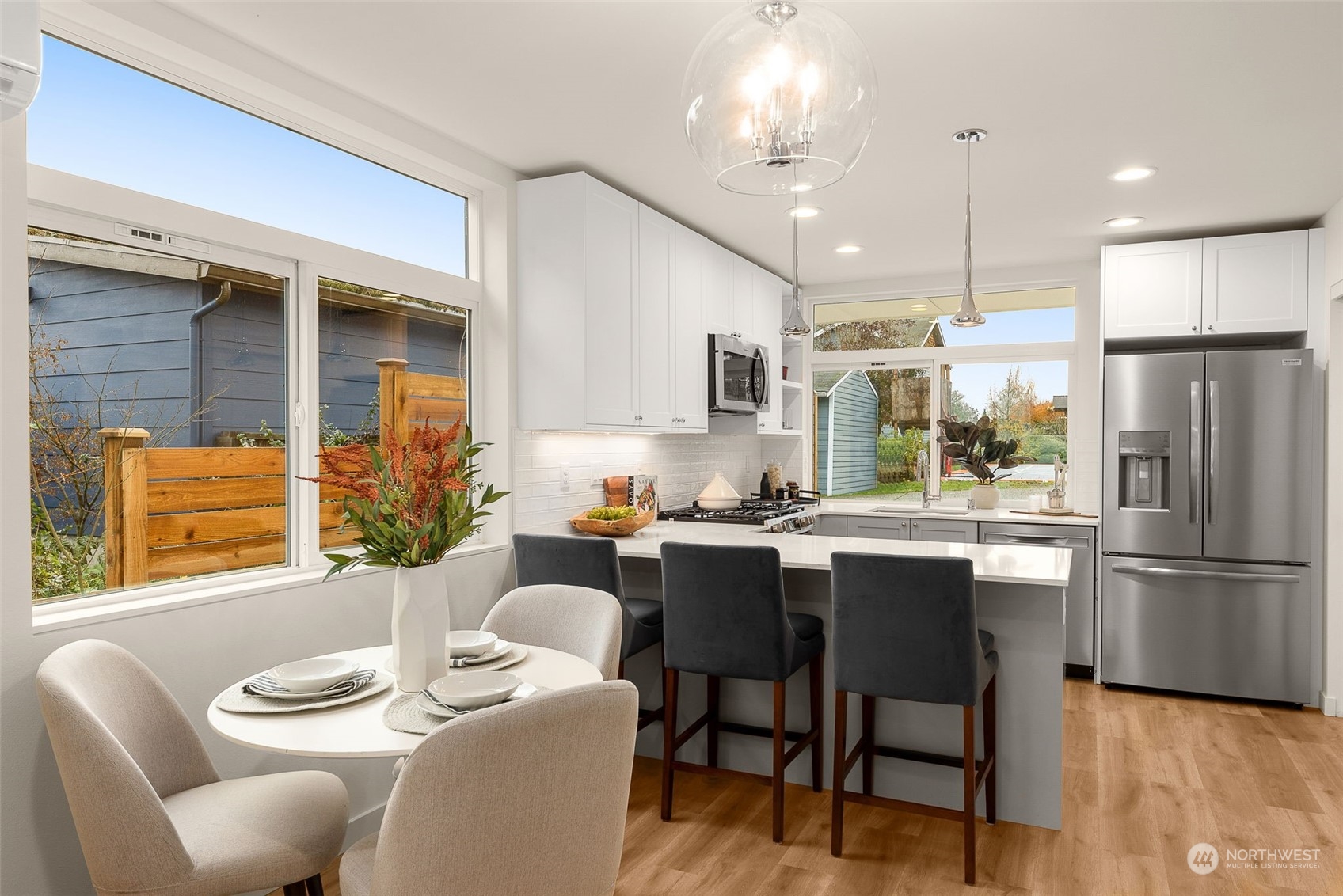 Bright and inviting, the open-plan kitchen and dining area are perfect for casual meals and entertaining.