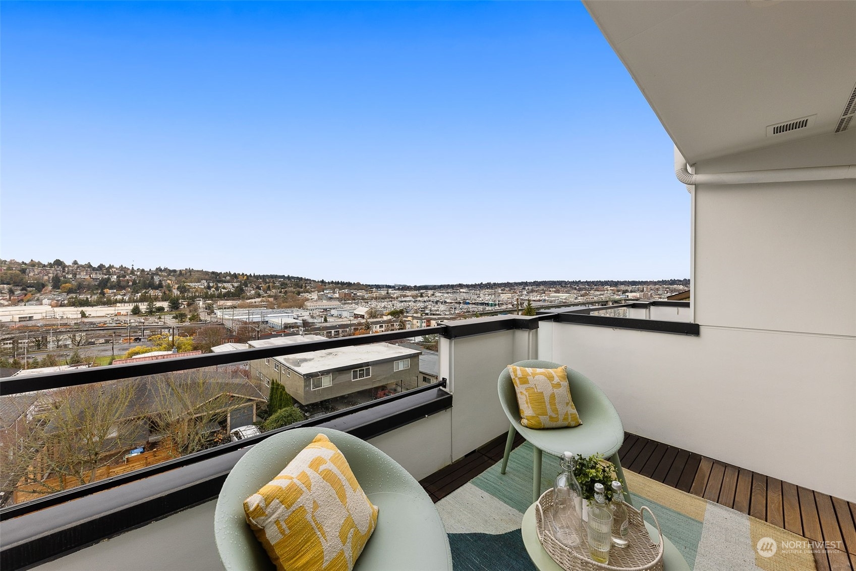 Bask in breathtaking panoramic views from this expansive outdoor space. This balcony offers a refreshing retreat above it all.